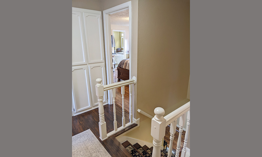 Upstairs Hall View Into Master Bedroom